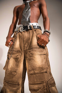 premium baggy brown denim cargo with structured side pockets and a heavyweight streetwear drape