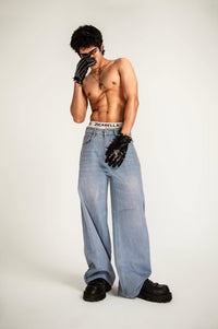 Jeans designed in denim with a structured fit and minimal aesthetic maintaining a premium drape and sharp oversized profile